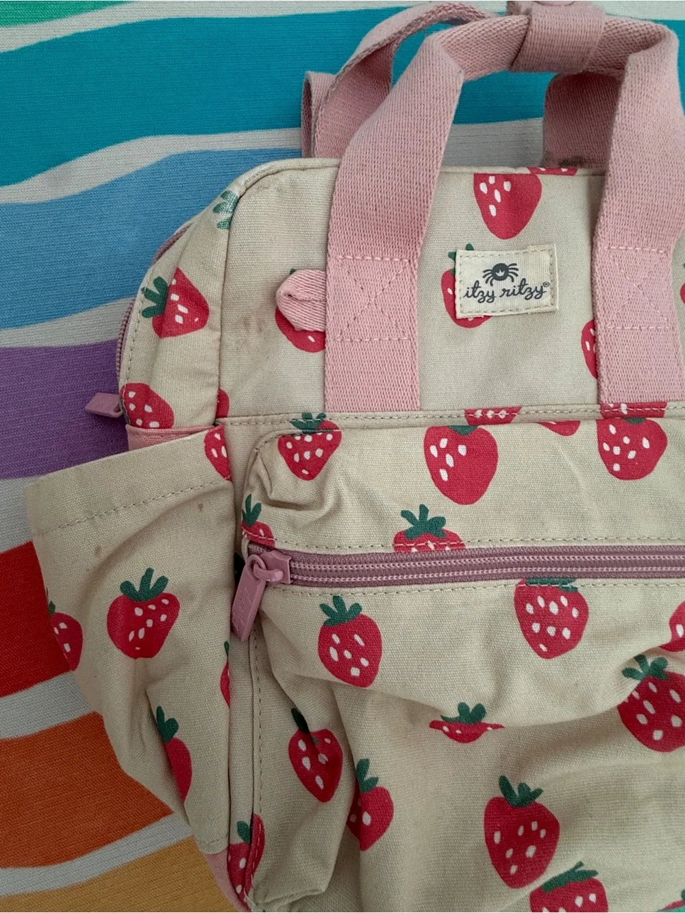 Itzy Ritzy playful strawberry